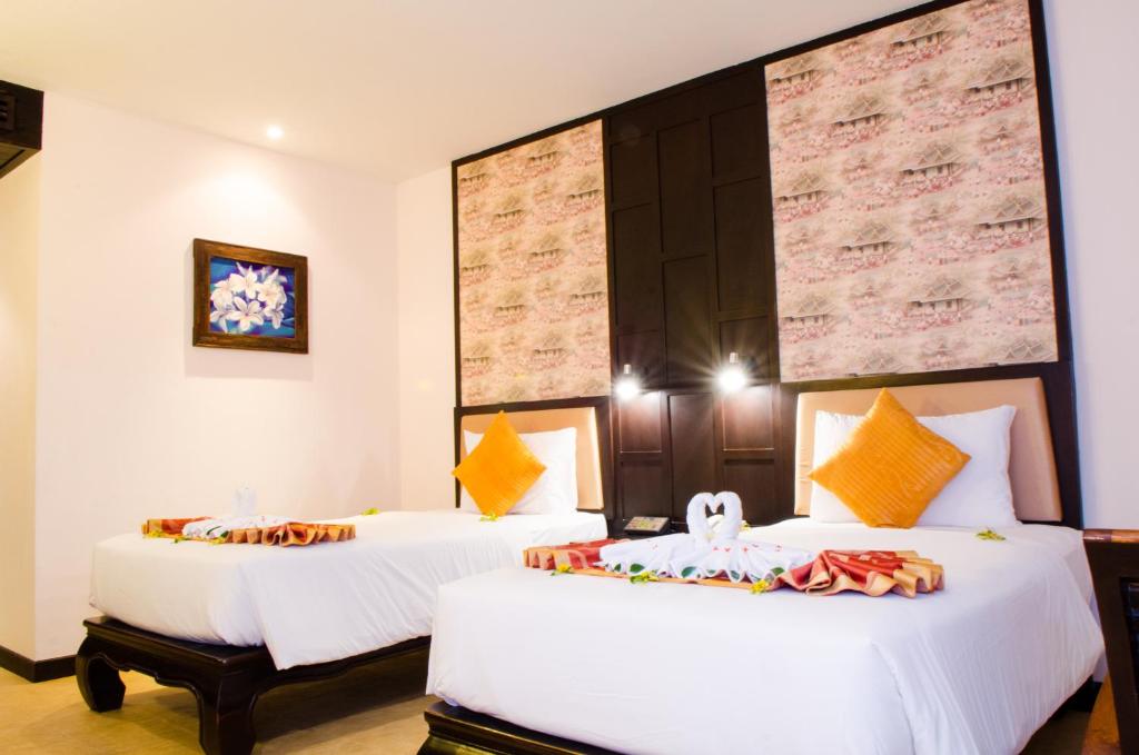 Двухместный (Двухместный номер Гранд Делюкс с 1 кроватью/2 отдельными кроватями и выходом к бассейну) курортного отеля Nipa Resort, Пхукет