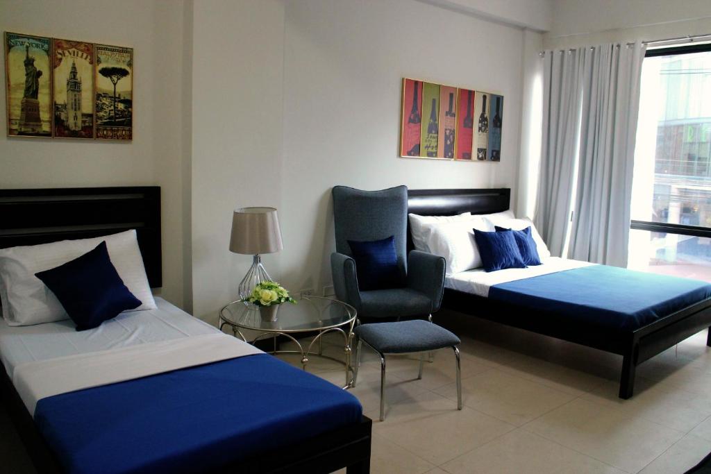 Двухместный (Двухместный номер с 1 кроватью или 2 отдельными кроватями) хостела Food District Hostel - Ortigas Kapitolyo, Манила