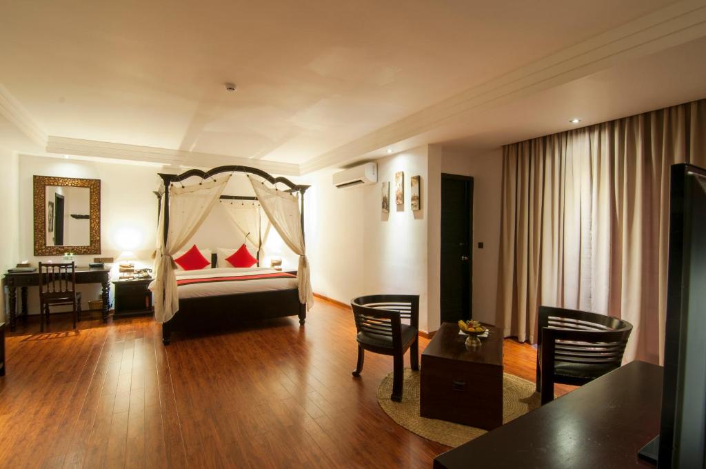 Апартаменты (Апартаменты-люкс с 1 спальней - Двухместный номер с 1 кроватью и собственным балконом) отеля La Rose Suites, Пномпень