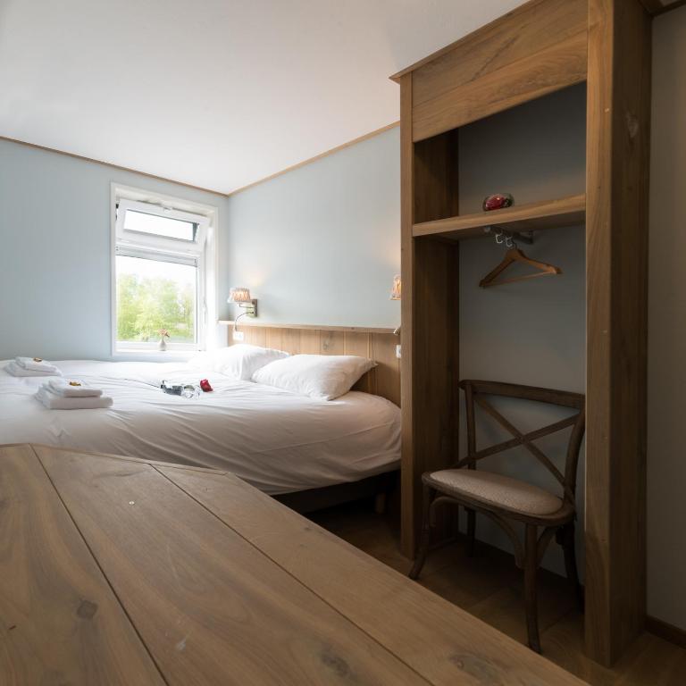 Двухместный (Бюджетный двухместный номер с 2 отдельными кроватями) отеля Hotel Giethoorn, Гронинген