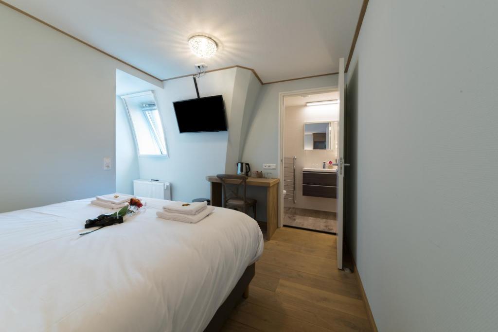 Двухместный (Стандартный двухместный номер с 1 кроватью или 2 отдельными кроватями) отеля Hotel Giethoorn, Гронинген