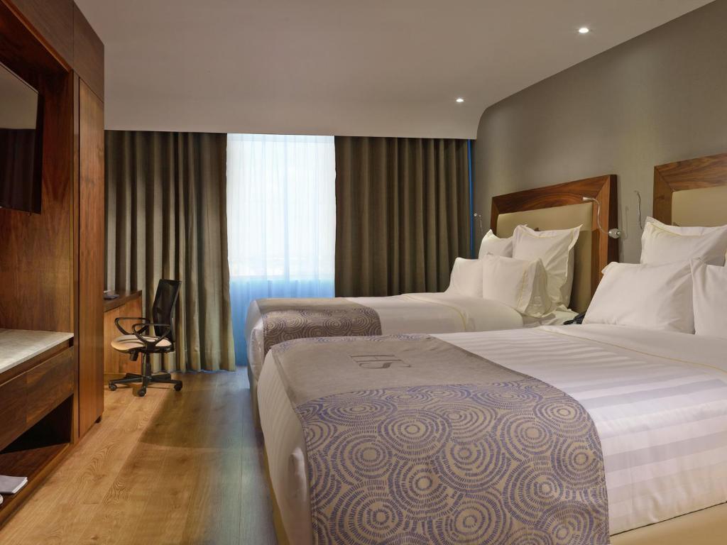 Двухместный (Номер Делюкс с кроватью размера «queen-size») отеля HS HOTSSON Hotel Irapuato, Ирапуато