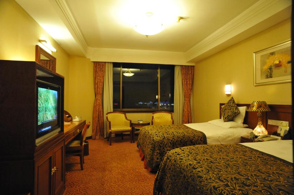 Двухместный (Mainland Chinese Citizen - Twin Room with Garden View) отеля Yantai Golden Gulf Hotel, Яньтай