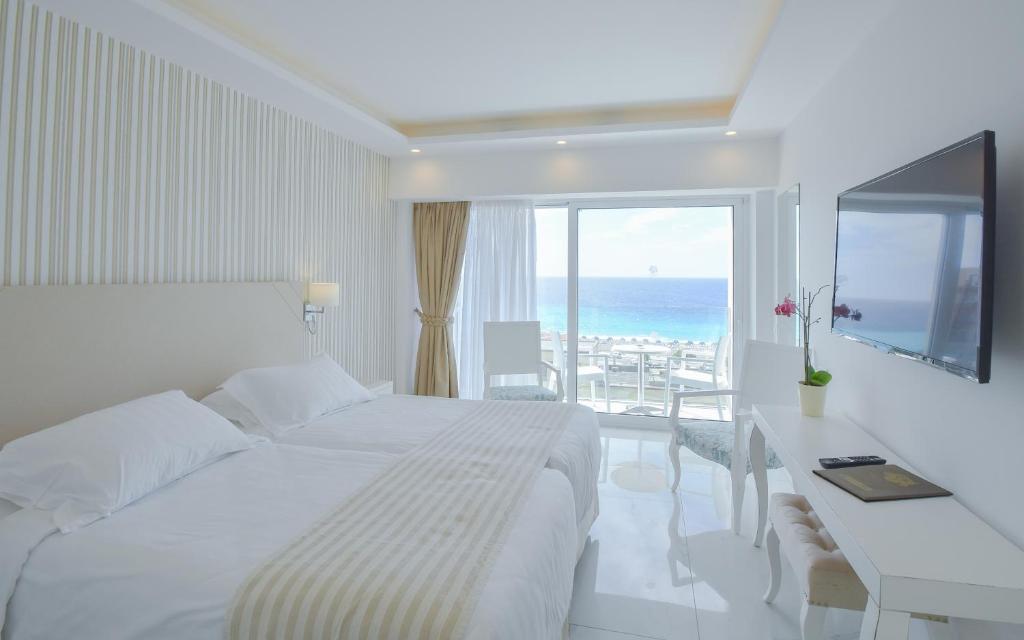 Двухместный (Двухместный номер с 1 кроватью или 2 отдельными кроватями и видом на море) отеля Ibiscus Hotel, Родос