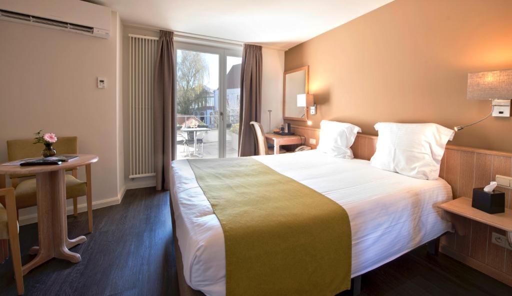 Двухместный (Классический двухместный номер с 1 кроватью или 2 отдельными кроватями) отеля Flanders Hotel, Брюгге