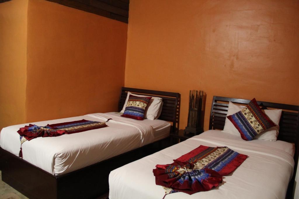 Двухместный (Стандартный двухместный номер с 2 отдельными кроватями) отеля Namkhong Guesthouse and Resort, Чианграй
