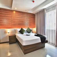 Апартаменты (Two-Bedroom Suite with Balcony (Smoking)) отеля Valero Grand Suites by Swiss-Belhotel, Манила