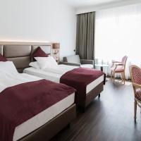 Двухместный (Улучшенный двухместный номер с 2 отдельными кроватями) отеля Crowne Plaza Salzburg - The Pitter, Зальцбург