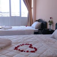 Двухместный (Улучшенный двухместный номер с 2 отдельными кроватями и видом на город) гостевого дома Thanh Nien Guesthouse - Vung Tau, Вунгтау