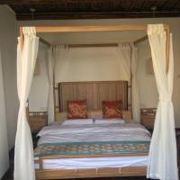 Двухместный (Двухместный номер с 1 кроватью и балконом (для 2 взрослых и 1 ребенка)) гостевого дома Begonia Guest House, Сучжоу