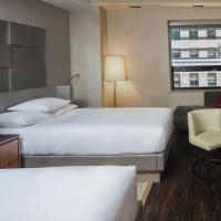 Четырехместный (Двухместный номер Делюкс с 2 двуспальными кроватями) отеля Grand Hyatt New York, Нью-Йорк