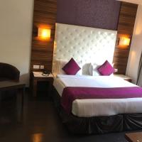 Двухместный (Улучшенный двухместный номер с 1 кроватью и балконом) отеля Hotel Ivory 32, Нью-Дели