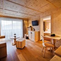 Сьюит (Полулюкс с балконом) отеля Alpin Garden Wellness Resort - Adults Only, Ортизеи