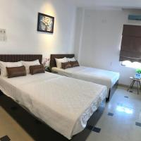 Четырехместный (Номер Делюкс с 2 кроватями размера «queen-size») отеля Vien Dong Hotel, Дананг