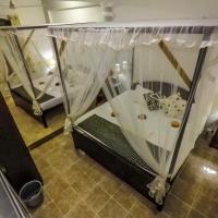 Четырехместный (Standard Quadruple Room with 2 King Beds) гостевого дома Beach Haven Guest House, Галле