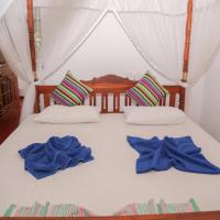 Двухместный (Deluxe Double Room with Balcony - 15% Discount on Whale Watching) гостевого дома Tithira Guest House, Мирисса