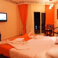 Трехместный (Улучшенный трехместный номер) курортного отеля Sphinx Aqua Park Beach Resort, Хургада