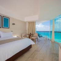 Сьюит (Угловой люкс Altitude с видом на океан) курортного отеля Krystal Grand Punta Cancún, Канкун