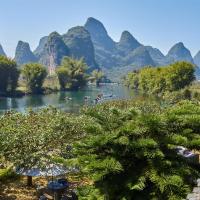 Семейный (Семейный номер с балконом с видом на реку) отеля Yangshuo Mountain Retreat, Яншо