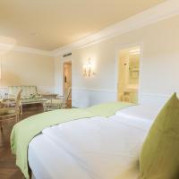 Сьюит (Классический номер Делюкс) отеля Crowne Plaza Salzburg - The Pitter, Зальцбург