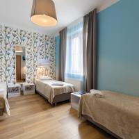 Трехместный (Стандартный трехместный номер с собственной ванной комнатой) хостела Premium Hostel, Краков