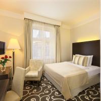 Двухместный (Улучшенный двухместный номер с 1 кроватью или 2 отдельными кроватями) отеля Grand Hotel Bohemia, Прага