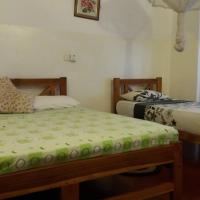 Трехместный (Трехместный номер с основными удобствами) гостевого дома Hotel Mango Garden, Канди