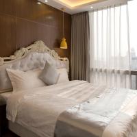 Апартаменты (Апартаменты Делюкс с 2 спальнями) апартаментов Boman Holiday Apartment Jie Deng Du Hui Branch, Гуанчжоу