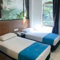 Двухместный (Двухместный номер Делюкс с 1 кроватью или 2 отдельными кроватями) отеля Koptown Hotel Kuala Lumpur, Куала-Лумпур