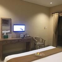 Двухместный (Двухместный номер Делюкс с 1 кроватью или 2 отдельными кроватями и видом на бассейн) семейного отеля Kailash Bali, Убуд