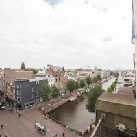 Двухместный (Улучшенный двухместный номер с 2 отдельными кроватями и видом на канал) отеля Dikker en Thijs Fenice Hotel, Амстердам