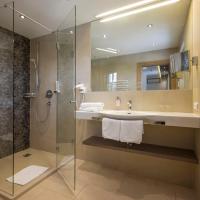 Двухместный (Двухместный номер с двуспальной кроватью и дополнительной кроватью) отеля Hotel Gabi, Зальцбург