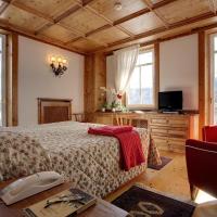 Сьюит (Люкс) отеля Hotel Cortina, Кортина-д'Ампеццо