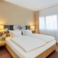 Двухместный (Улучшенный двухместный номер с 1 кроватью) отеля H+ Hotel Zürich, Цюрих