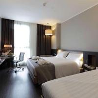 Трехместный (Standard Triple Room with 1 Queen and 1 Single Bed - Non-Smoking) отеля Best Western Premier CHC Airport, Генуя