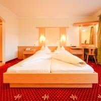 Семейный (Семейный номер с балконом) отеля Hotel Persal, Майрхофен