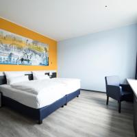 Двухместный (Улучшенный двухместный номер с 1 кроватью или 2 отдельными кроватями) отеля Carathotel Düsseldorf City, Дюссельдорф