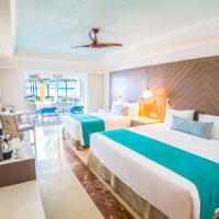 Сьюит (Полулюкс Гран с прямым видом и выходом на пляж) курортного отеля Gran Caribe All Inclusive - Panama Jack Resorts Cancun, Канкун