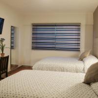 Двухместный (Стандартный двухместный номер с 2 двуспальными кроватями) отеля Casa Massima Hotel, Леон (Штат Гуанахуато)