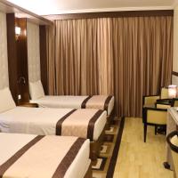 Трехместный (Стандартный трехместный номер с балконом) отеля Al Khaleej Grand Hotel, Дубай