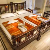 Двухместный (Двухместный номер Делюкс с 1 кроватью или 2 отдельными кроватями) отеля Krishna Palace, Джайпур