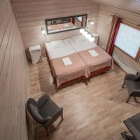 Номер (Стандартное шале (для 4 человек) с сауной) отеля Lapland Hotels Ounasvaara Chalets, Рованиеми