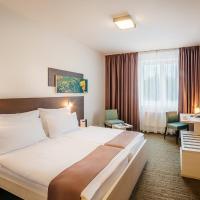 Двухместный (Двухместный номер Делюкс с 2 отдельными кроватями) отеля Maximus Resort, Брно