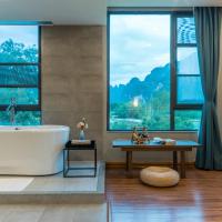 Двухместный (Superior Double Room with River View free afternoon tea available) отеля Yangshuo Zen Garden Resort, Яншо