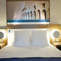 Двухместный (Улучшенный двухместный номер с 1 кроватью) отеля Mercure Roma Centro Colosseo, Рим