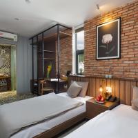 Двухместный (Улучшенный двухместный номер с 2 отдельными кроватями) отеля Marilyn Boutique Hotel Nha Trang, Нячанг