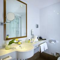 Двухместный (Двухместный номер с двуспальной кроватью и дополнительной кроватью) отеля Hotel Innsbruck, Инсбрук