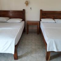 Двухместный (Двухместный номер с 1 кроватью или 2 отдельными кроватями и террасой) семейного отеля Jacko House Uluwatu, Улувату