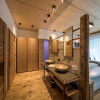 Двухместный (Двухместный номер Делюкс с 1 кроватью и ванной) отеля Post Hotel Paznaun, Зее