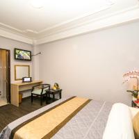 Двухместный (Улучшенный двухместный номер с 1 кроватью) отеля Nouveau Happy Inn, Хошимин